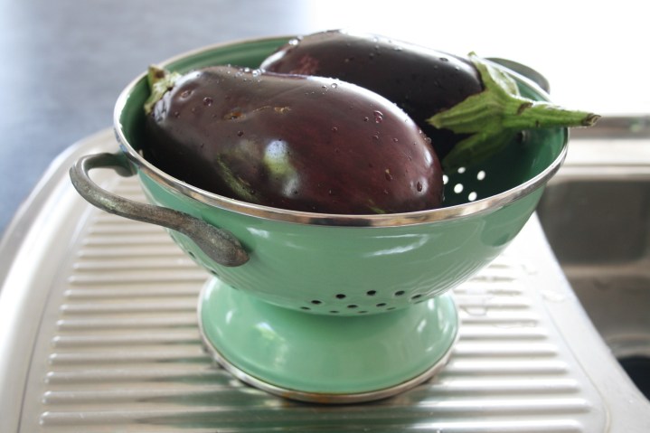 Eggplant, about to be made into ratatouille, March 2010. I miss this pale green colander.