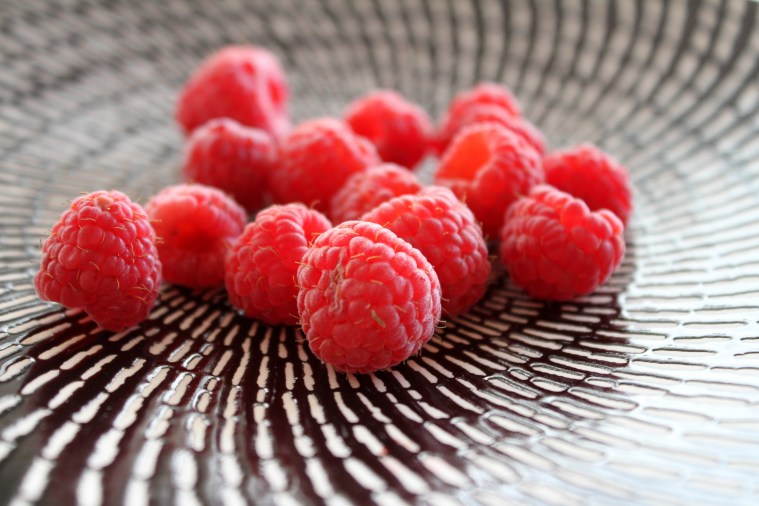 First raspberries of the season - this really demonstrates the clarity and detail I am seeing in photos taken with the 7D. IMG_0111