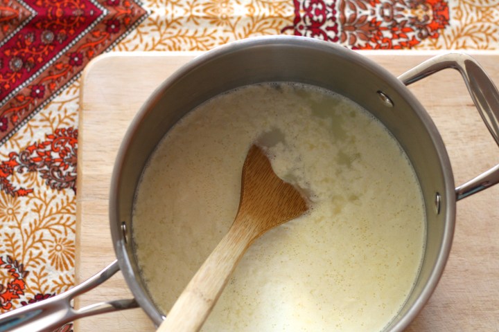 Homemade ricotta - Step one: heat milk and buttermilk until the curds separate from the whey