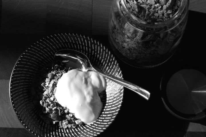 Granola and yoghurt for breakfast with shadows