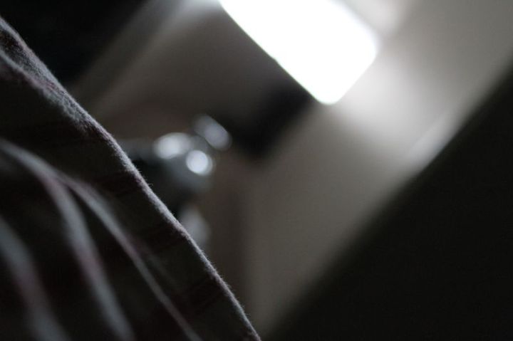 Early morning, in bed, watching the sky as it lightens