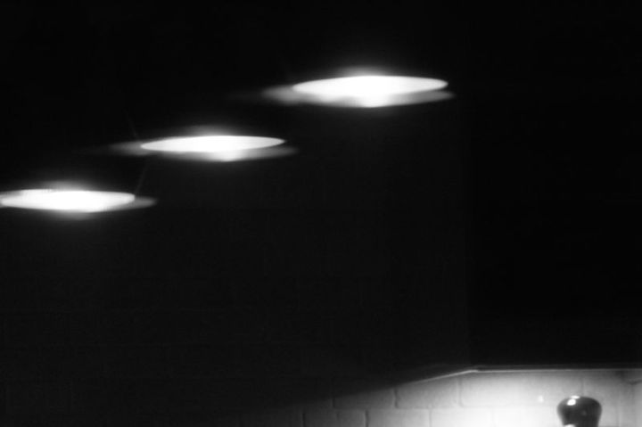 Lamp shades in the kitchen, at night, monochrome