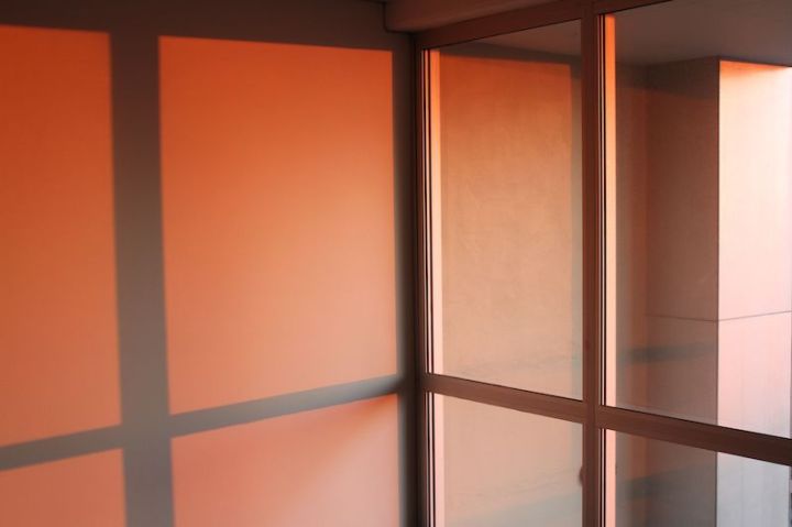 A spectacular sunrise, red light streaming into the apartment