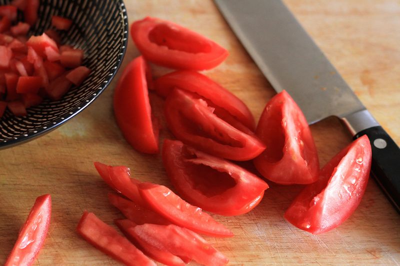 Roma tomatoes are the best for this soup as their flesh will stay firm in the warm soup