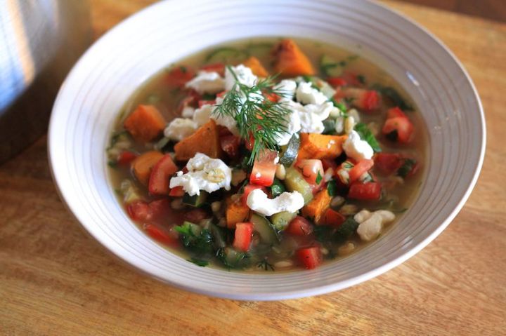 A spring soup, with pearl barley, roasted pumpkin, fresh tomato and herbs