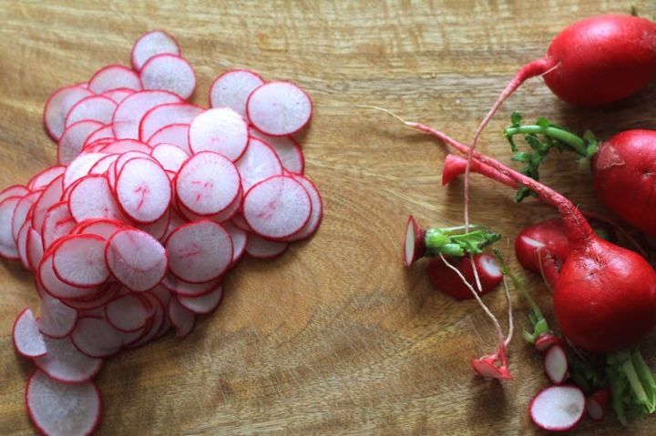 Slicing radishes with a mandolin for Quick Pickled Radishes