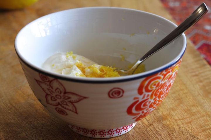 Stirring lemon zest and honey into labneh