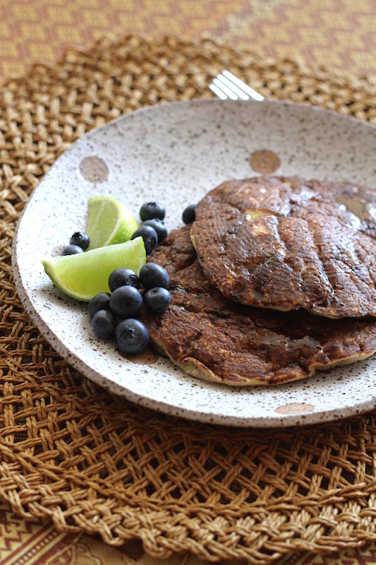 Banana Buckwheat Pancakes with maple syrup, lime and berries