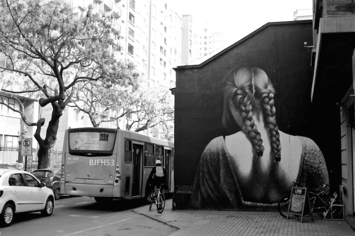 Girl with two plaits - street mural, Santiago Chile