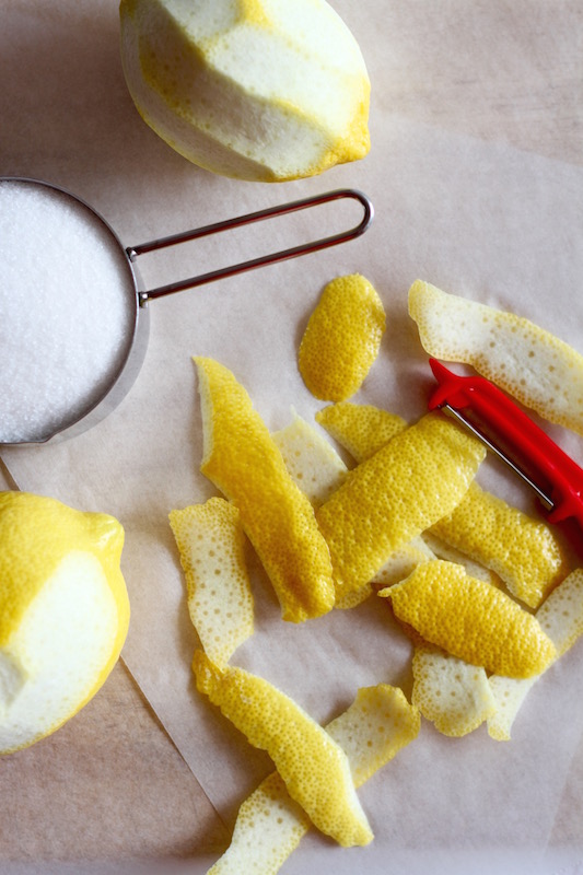 Removing lemon peel to make Strawberry & Peppercorn Shrub