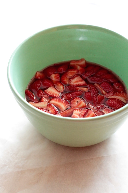 Apple cider vinegar is added to strawberries and lemon-infused sugar