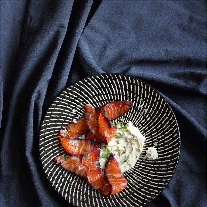 Blackcurrant-cured salmon served with herbed cream cheese