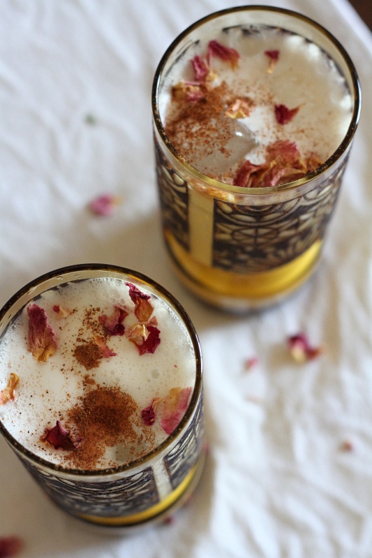 Horchata is a naturally vegan Mexican beverage made with soaked almonds, rice and cinnamon. This recipe includes a touch of rosewater and honey to sweeten and it is deliciously cooling served over ice